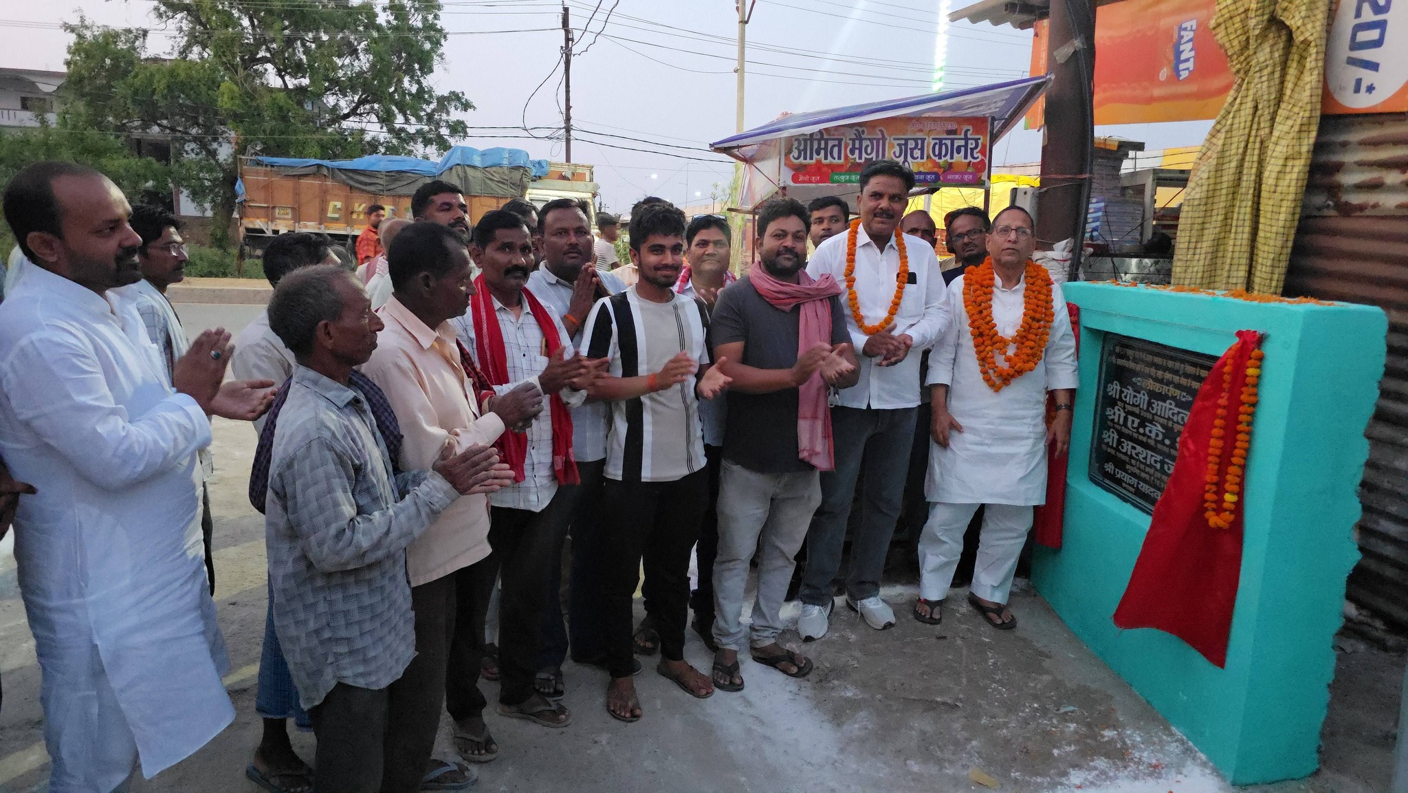 Arshad Jamal inaugurating street light project in Hakikatpur Mau with Prayag Yadav.